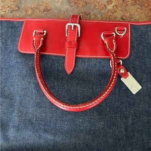 Patriotic Dooney and Bourke denim bag.  Exterior is in great condition